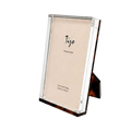 Acrylic Photo Frame 5x7 in tortoiseshell-patterned Lucite with clear beveled edges, shown upright from the front.