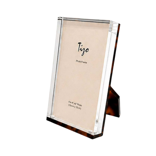Acrylic Photo Frame 5x7 in tortoiseshell-patterned Lucite with clear beveled edges, shown upright from the front.