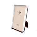 Acrylic Photo Frame in tortoiseshell-patterned Lucite with clear beveled edges, displayed vertically to hold a standard 4 x 6 photo.