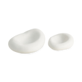 Crafted in Italy, these organic shaped ceramic bowls have a matte white finish and are available in two sizes.