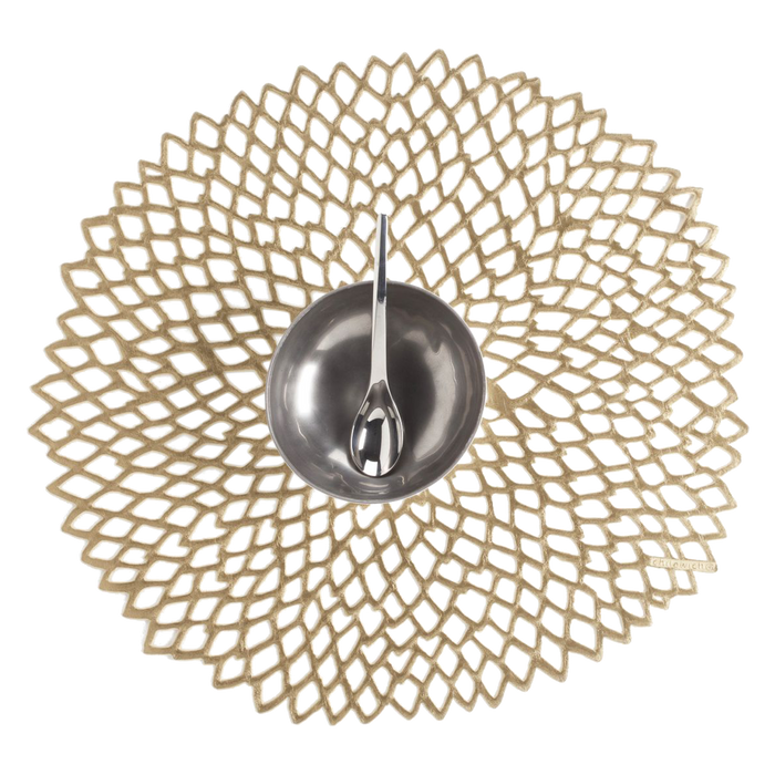 Taking their innovative "Molded" technique a step further, the Chilewich Dahlia placemat is an intricate cutwork design.