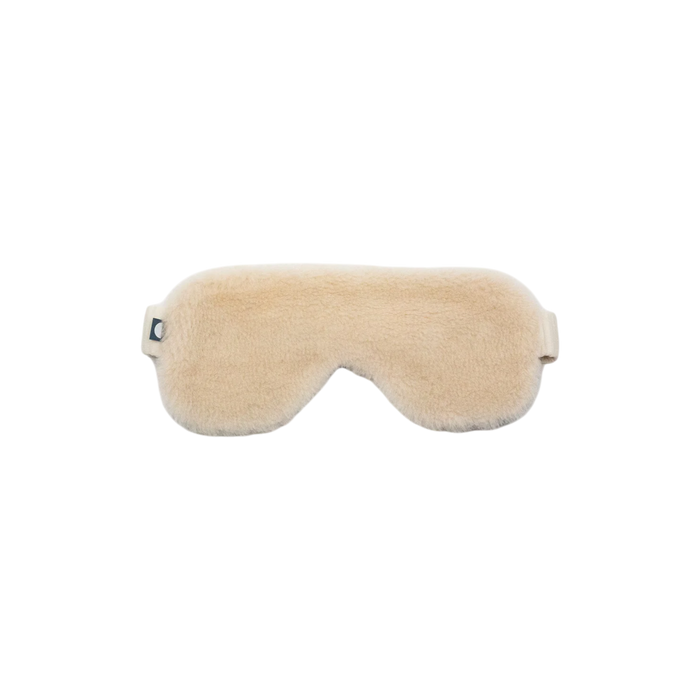 Merino Fleece Sleep Mask in soft ivory with plush merino-blend fleece, contoured eye coverage and an adjustable strap for a comfortable, secure fit.